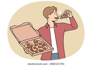 Man bites into pizza and holds box from italian pizzeria, enjoying taste of fresh food delivered from restaurant. Guy satisfies appetite or hunger with delicious pizza with pepperoni and mushrooms