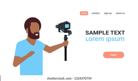 man blogger broadcasting live stream report shooting selfie video african guy recording himself using camera gimbal stabilizer blogging concept copy space horizontal