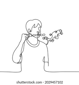 man blows bubbles through a bubble wand - one line drawing. concept Children's animator shows how to make bubbles, an adult tries children's entertainment 