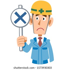 A man in a blue workwear construction site holds a wrong answer tag