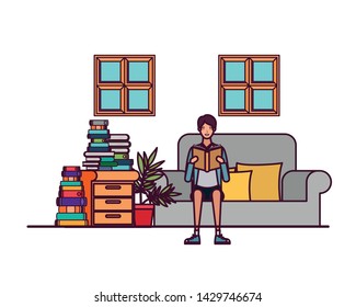 man with book in hands in living room