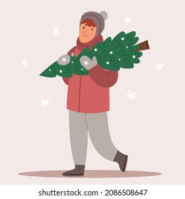 The man bought a Christmas tree. Christmas fair. Winter mood. Shopping before the new year.