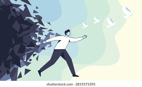 Man breaking free from dark negative thoughts and transforming them into flying white doves of peace and hope.