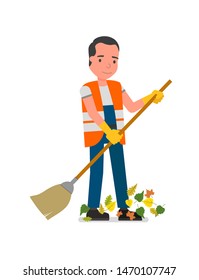 A man with a broom sweeps away fallen leaves. Isolated on a white background.