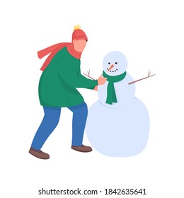 Man build snowman flat color vector faceless character. Guy play with snow. Christmas time. Festive season activity isolated cartoon illustration for web graphic design and animation