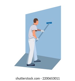 A man, a builder, in a working combine, paints a wall with a roller. Painter.