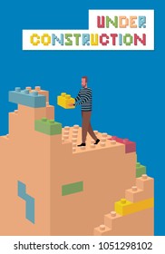 Man builds tower from building bricks: Under construction concept