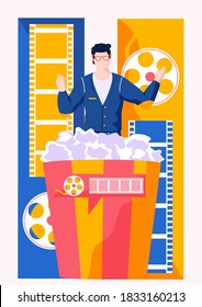 A man in a business suit with glasses getts out of a large bucket of popcorn on the background of a film strip. Online cinema. Watching a movie on the internet. Cinematograph. Online entertainment