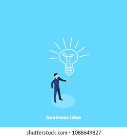 a man in a business suit stands on a blue background and a painted light bulb, an isometric image