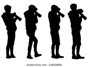 Man with a camera on white background