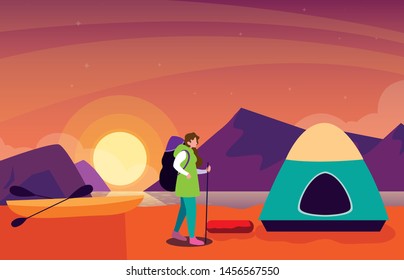 man with camping tent on the river shore