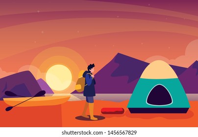 man with camping tent on the river shore
