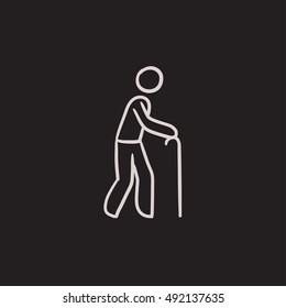 Man with cane vector sketch icon isolated on background. Hand drawn Man with cane icon. Man with cane sketch icon for infographic, website or app.