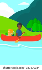 Man canoeing on the river.
