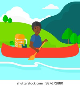Man canoeing on the river.