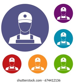 A man in a cap and uniform icons set in flat circle reb, blue and green color for web