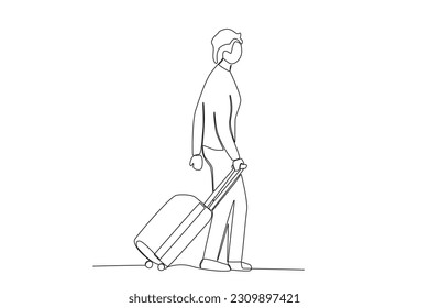 A man carries suitcase