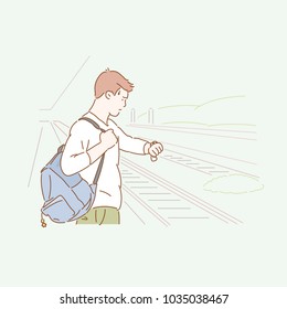 A man carrying a backpack is waiting for the train on the platform. hand drawn style vector doodle design illustrations.