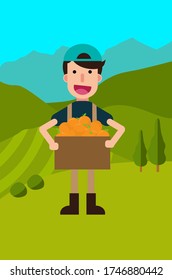 a man carrying a box of oranges with mountain view