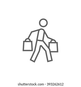 Man carrying shopping bags line icon.