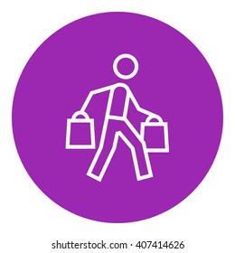 Man carrying shopping bags line icon.