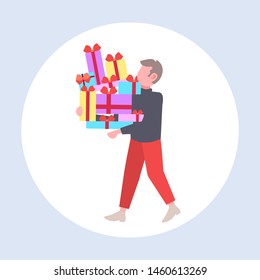 man carrying stack of wrapped gift boxes big seasonal sale shopping concept guy holding colorful presents flat full length