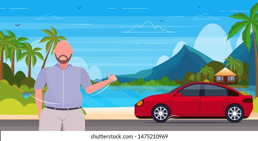 man catching auto car sharing transportation service concept summer vacation tropical island seascape background horizontal portrait
