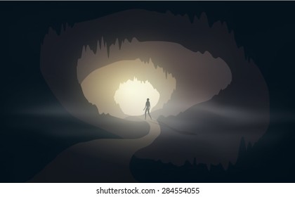 man at cave entrance with mist editable vector