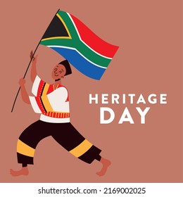 man celebrating Heritage Day Africa with flag