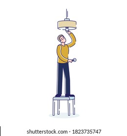 Man changing light bulb in ceiling lamp while standing on stool on white background. Cartoon male character replacing and repairing electric lamp. Linear vector illustration