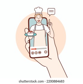 Un chef cocinero en la pantalla del smartphone. Es una metáfora para aplicaciones de libros de recetas. Ilustraciones de diseño vectorial de estilo dibujado a mano.