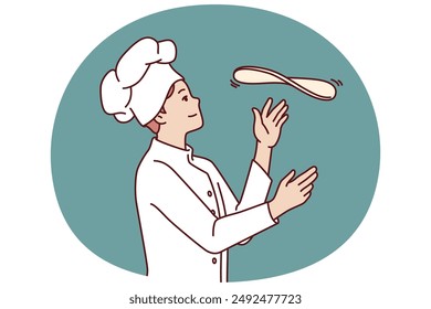 El chef principal prepara la pizza tirando la masa en el restaurante de cocina abierta con comida italiana tradicional. Chico con sombrero de chef trabaja en la pizzería y cocinar la pizza de acuerdo a la receta clásica.