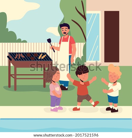 man with childs having barbecue