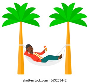 Man chilling in hammock.