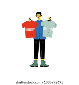 Man Choosing Shirts During Shopping at Clothing Store, Guy Purchasing at Mall or Shop Vector Illustration