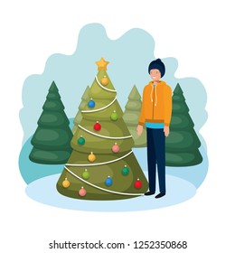 man with christmas tree in landscape