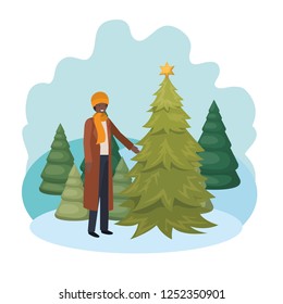 man with christmas tree in landscape