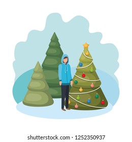 man with christmas tree in landscape
