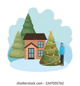 man with christmas tree outside of the house