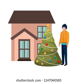 man with christmas tree outside the house