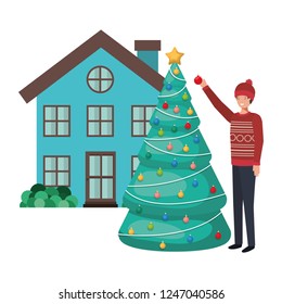 man with christmas tree outside the house