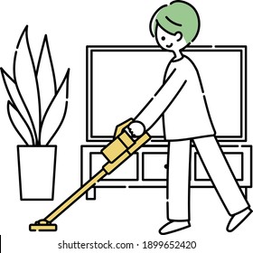 A man cleaning in the living room