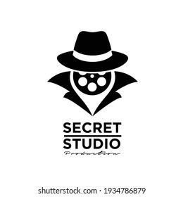 man coat hat spy film logo icon design