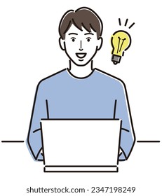 A man coming up with a good idea in front of a laptop