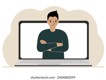 Man communicates via videoconference through laptop screen. The concept of online meetings, webinars, remote work or work from home.