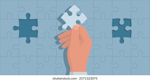 Man completing a jigsaw puzzle, he is holding a piece and thinking