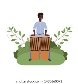 man with congas and branches and leaves in the background