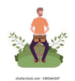 man with congas and branches and leaves in the background
