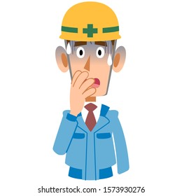 Man in construction site in blue work clothes turns pale