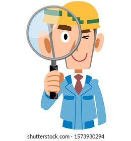 Man in construction site in blue work wear checks with magnifying glass
